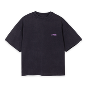 LA SIESTA Created to Create vintage black oversized boxy t-shirt with lilac logo, front view