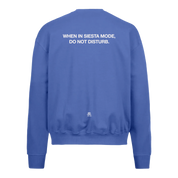 LA SIESTA cobalt blue oversized crew neck sweatshirt with “When in Siesta Mode, Do Not Disturb” text, back view